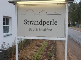 Strandperle，位于施维洛塞的酒店