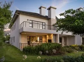 Pearl Valley family golf lodge on nature lake with mountain views