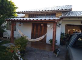 Casa Feliz in Tramandaí，位于特拉曼达伊的酒店