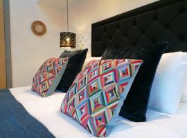 1 bedroom suite in Holt with parking，位于霍尔特的住宿