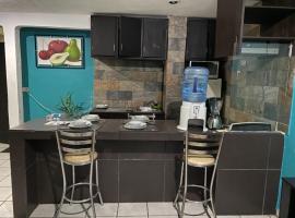 Departamento con terraza verde，位于乔卢拉的酒店