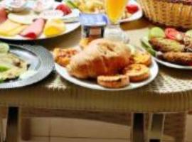 Pyramids Heritage suites，位于Ghaţāţī的酒店