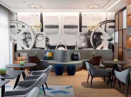 Courtyard by Marriott Oberpfaffenhofen Munich South，位于吉尔兴的万豪酒店