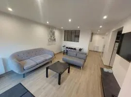 Appartement avec terrasse dans la verdure