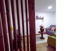 Apartamento con jardín a 5 minutos de la playa，位于科伦加的酒店
