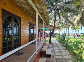 Furtado Beach Cottages，位于比纳里姆的酒店