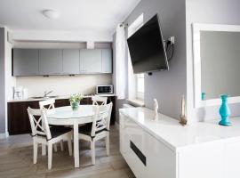 Urokliwy cichy apartament blisko morza，位于斯维诺乌伊希切的带热水浴缸的酒店