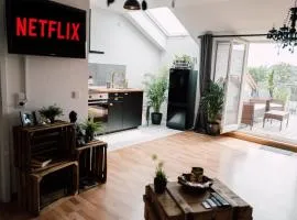 Rooftop Buddha Lounge - Ferienwohnung im Dachgeschoss in Leipzig mit Waschmaschine und Netflix