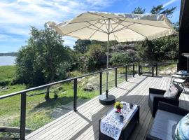 Awesome Home In Skjærhalden，位于斯科耶霍伦的酒店