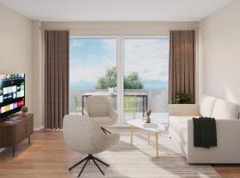 Visionary Hospitality Embrach, Zürich - Premium Apartments with Free Parking, Washer, Kitchen, Rooftop, Coworking-Space, 15' Airport，位于Embrach的酒店