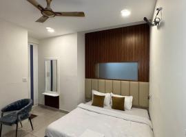 Taste of Paradise 94 Hotel Rooms，位于Lāndrān的酒店