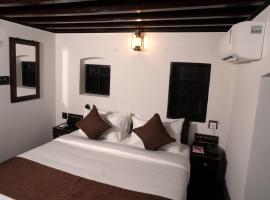 Krishnapuram Heritage Resort，位于Karimpuzha的酒店