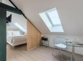 Studio sous les combles côté cour, parking gratuit