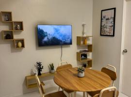 SM Naga City 2BR River view Balcony with Fiber Internet，位于那牙的酒店
