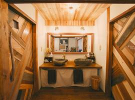 宿たぬきのねどこ GUESTHOUSE TANUKI，位于Tokoname的酒店