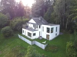 Panoramic villa with private sauna in Erezée