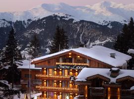 Snow Lodge Hotel Courchevel 1850，位于谷雪维尔车奴斯滑雪缆车附近的酒店