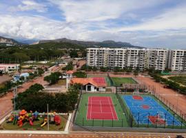 CLUB HOUSE CON 3 PISCINAS Y BBQ Apartamento，位于里考尔特的酒店