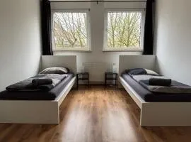 Case Four Boardinghouse mit Parkplatz, Küche, Waschmaschine und Trockner