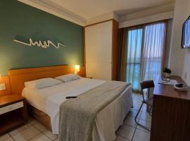 Espaço charmoso na ilha de Vitória Praia do Canto，位于维多利亚的酒店