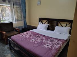 The Cozy Inn Kiwenda Kampala, Uganda，位于Kavule的酒店
