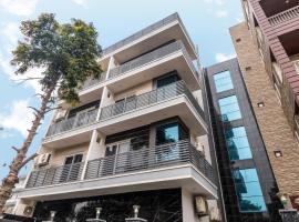 Hotel New Expoo Mart By The Travelage，位于大诺伊达的酒店