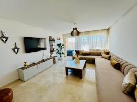 Azure Nest - Sea View Duplex with Golf and Pool Access in Taghazout Bay，位于塔姆拉赫特乌兹达尔的酒店