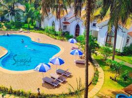Susegad Suites Arpora Apartments & Villas with Reserved Parking，位于阿伯来的公寓