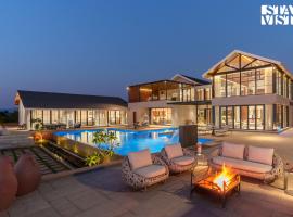 StayVista at Villa Wine with Pool, Jacuzzi, Bonfire，位于Pādli的酒店