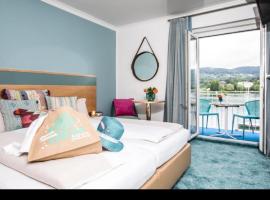 Strandhaus am Wörthersee，位于沃尔特湖畔韦尔登的酒店