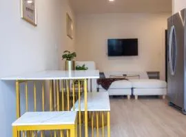Cozy 1BR with Private Balcony, Gym, Pool & Workspace