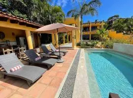 Twenty Steps from Litibu Beach at this Hideaway