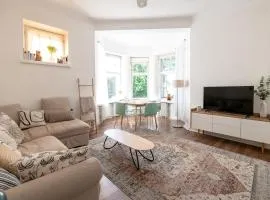 2ndhomes 2BR City Center Apartment with Balcony & Park view