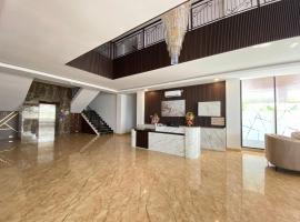 Sans Vibes Syariah Viandara Pekanbaru，位于Parit的酒店