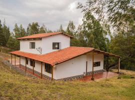 Acogedora casa campestre en Pesca Boyaca，位于拉基拉的酒店
