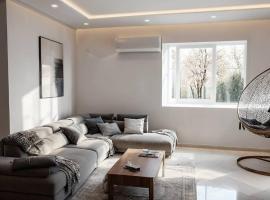 Superbe Etage Villa avec balcon, BBQ，位于Oulad Maʼammar的低价酒店