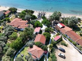 Physis Oikos Beachfront Apartments，位于斯基亚索斯镇的酒店