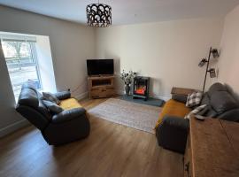 New cosy ground floor flat，位于霍伊克的酒店