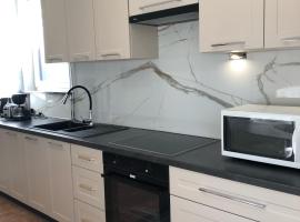 Lägenhet Thujan, Solrosen i Simrishamn-Österlen，位于锡姆里斯港的酒店