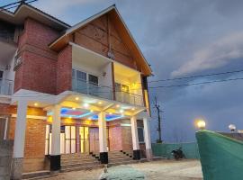 A R villa and cottage，位于古尔马尔格的酒店