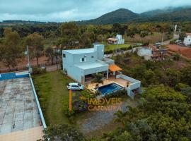 Casa com piscina Piumhi Capitolio，位于皮乌米的酒店