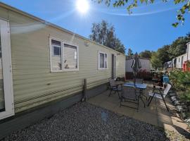 Highland getaway in kingussie golf club，位于金尤西的酒店