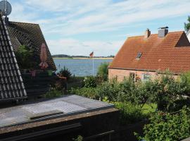 Ferienwohnung mit Balkon und Schleiblick，位于马斯霍尔姆的酒店