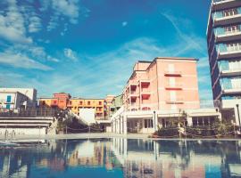 Ai Pozzi Village Resort & SPA，位于洛阿诺的带按摩浴缸的酒店