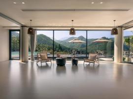Wild Persimmon Manor Cove Mist Healing Hot Spring，位于安吉县的酒店