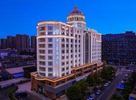东莞塘厦高铁南站锦江都城酒店，位于林村的酒店