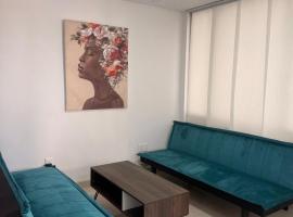 Habitación pequeña a una cuadra de Ventura Plaza，位于库库塔的酒店