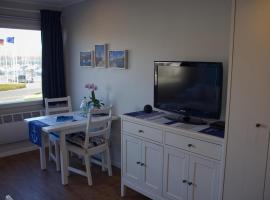 Inselblume 73 - G&uuml;nstige Ferienwohnung am S&uuml;dstrand，位于费曼城堡的带泳池的酒店