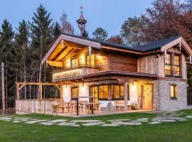 Luxus Ferienhaus - Alpine Eleganz trifft Outdoor-Jacuzzi und Zirbensauna