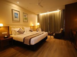 Hotel Aashray Inn，位于胡布利的酒店